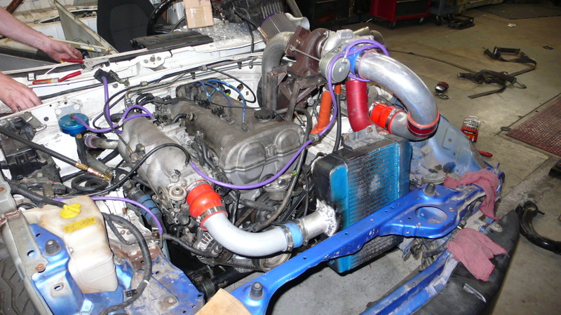 Illustration for article titled Eyesore Racing's Ghettocharged Miata Fears No Turbocharged Peugeot Surrender Monkeys!